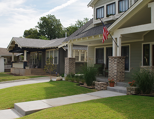 sidewalk view of homes in urban medium LUTA