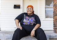 person sitting on front porch