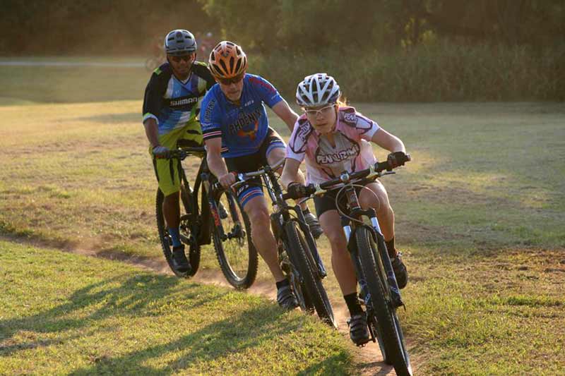 Riders push through the technical course at Bluff Creek Park